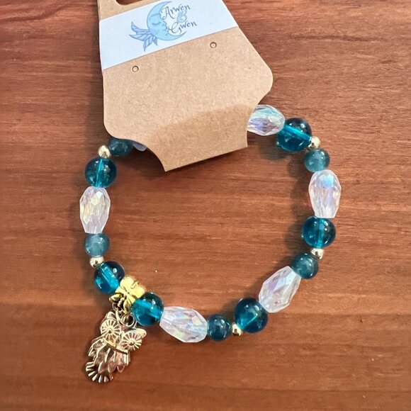 Arwen and Gwen Stretchy Bracelet, Beaded, Teal and Clear w/ Gold Tone Owl Charm - Picture 2 of 2